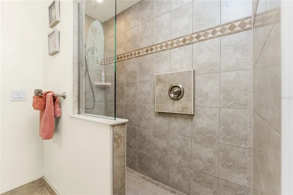 an aerial view of a city with ocean view