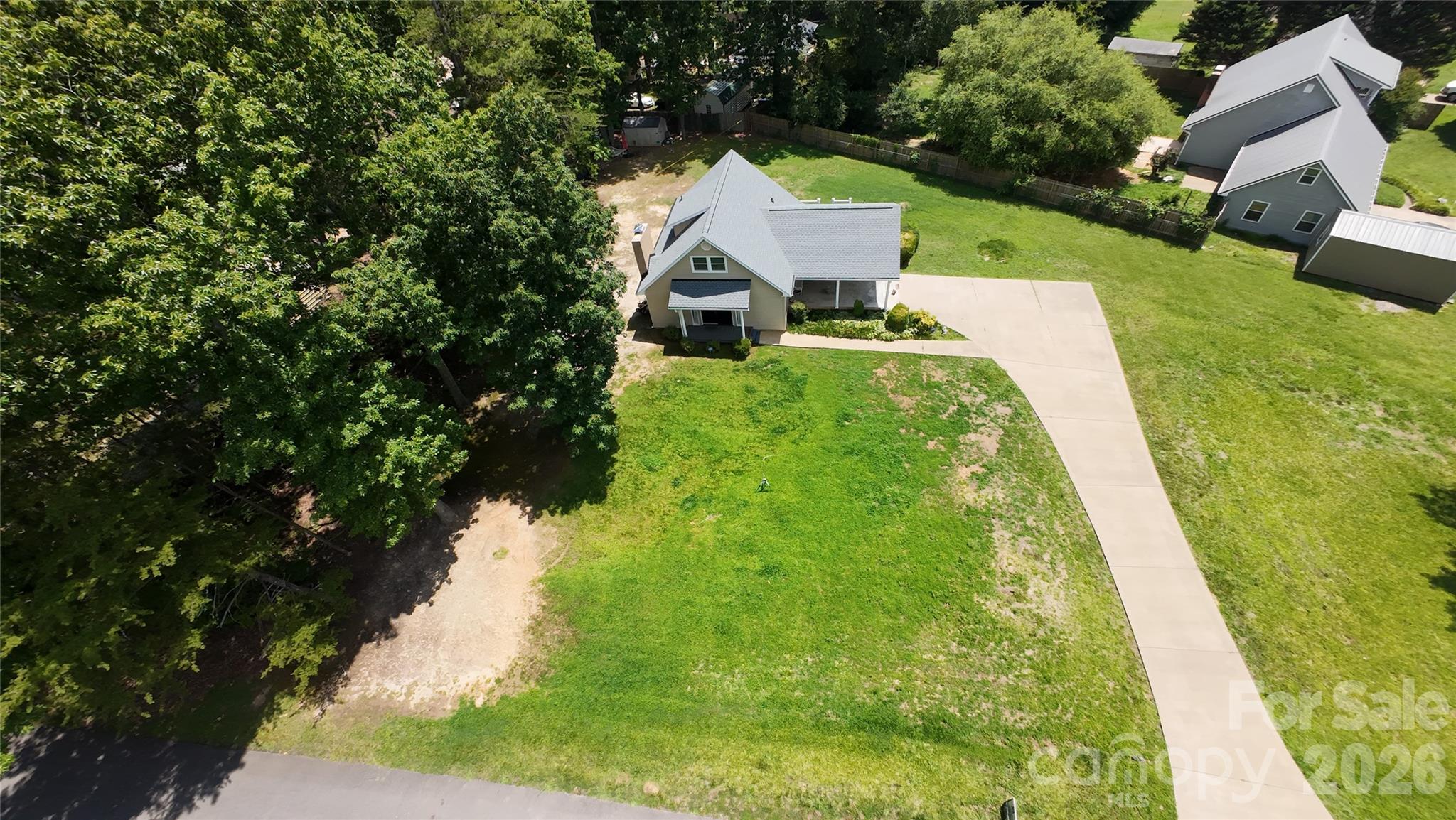 122 Rockman Road Grover, NC 28073 - Photo 5 of 45 a aerial view of a house with swimming pool and green yard