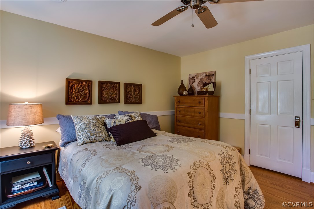 2101 Ramsgate Square North Chesterfield, VA 23236 - Photo 21 of 42 a bedroom with a bed and wooden floor