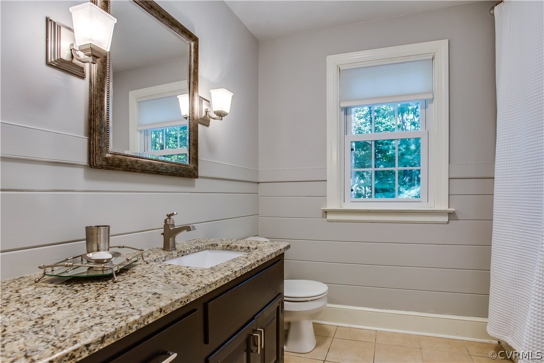 2101 Ramsgate Square North Chesterfield, VA 23236 - Photo 24 of 42 a bathroom with a granite countertop sink and a mirror