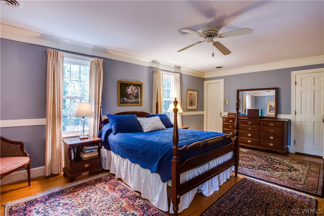 2101 Ramsgate Square North Chesterfield, VA 23236 - Photo 28 of 42 a bedroom with a bed and wooden floor
