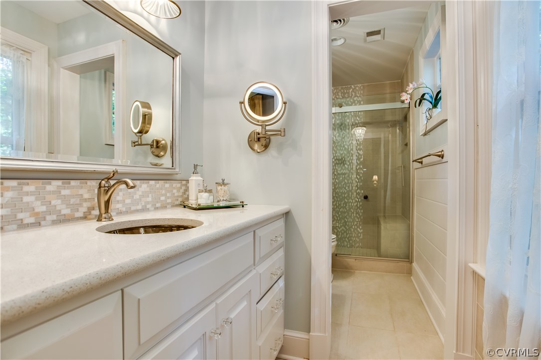 2101 Ramsgate Square North Chesterfield, VA 23236 - Photo 29 of 42 a bathroom with a sink and a mirror
