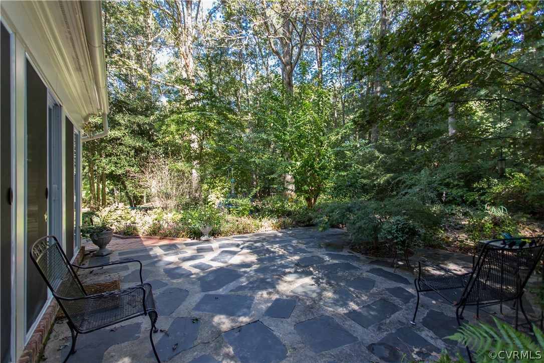 2101 Ramsgate Square North Chesterfield, VA 23236 - Photo 34 of 42 a view of backyard with outdoor seating and trees