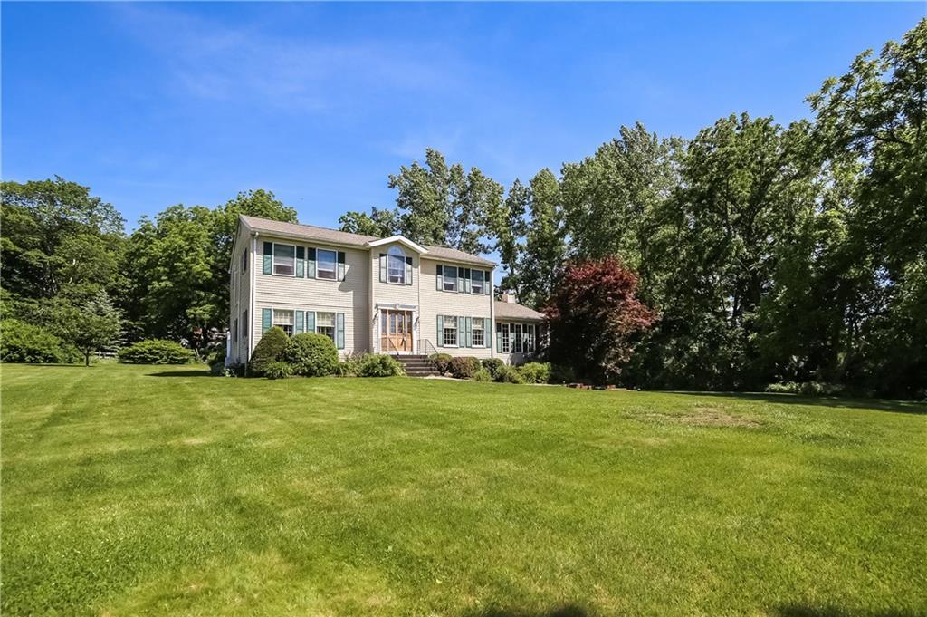2 Ridgeview Terrace Brookfield, CT 06804 - Photo 1 of 1 a front view of a house with a yard