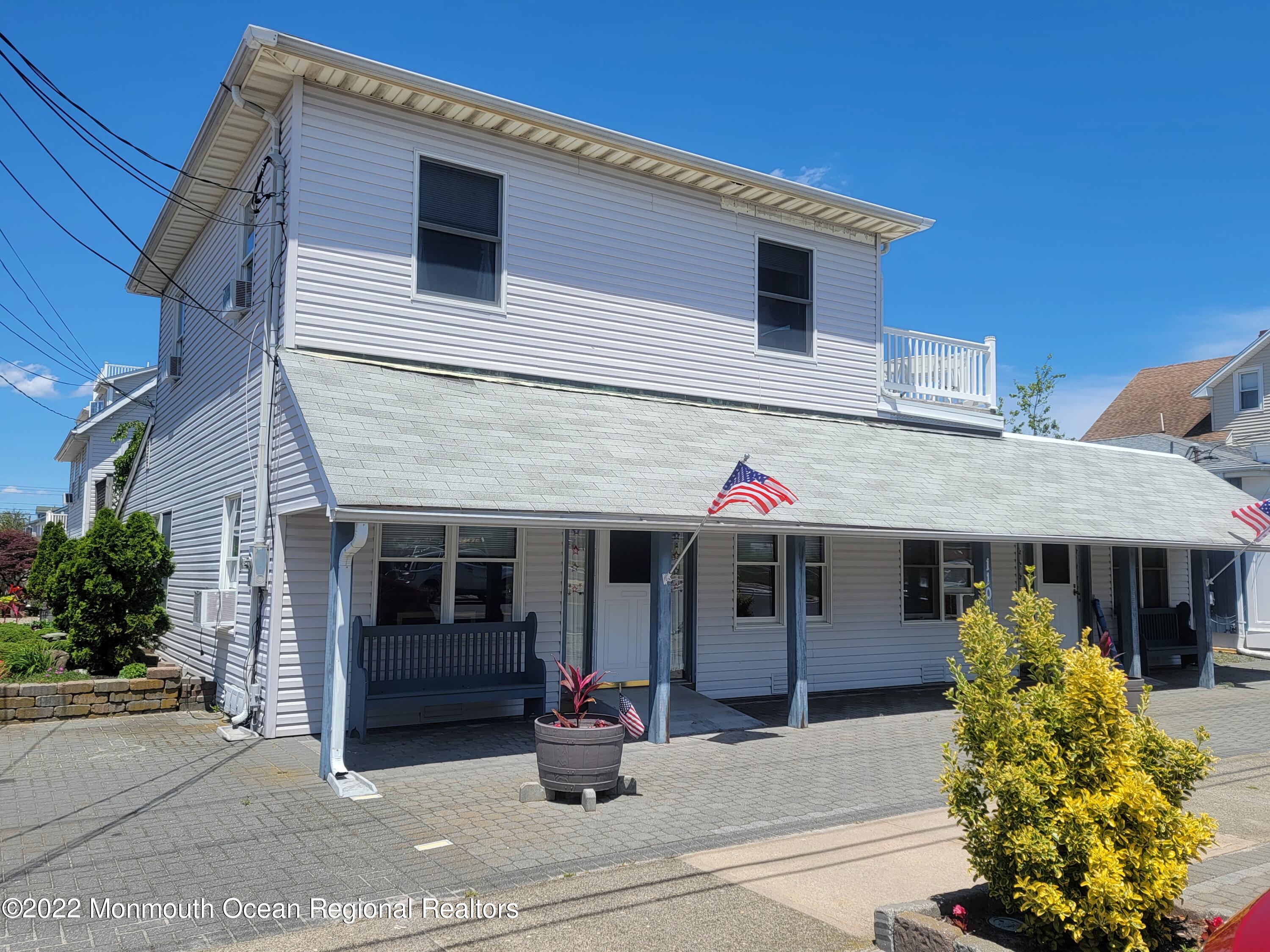 110 5th Avenue Seaside Park, NJ 08752 - Photo 2 of 25 a front view of a house with sitting area