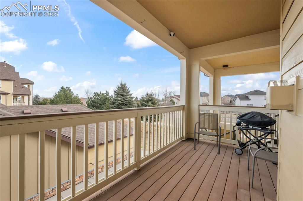 5378 Palomino Ranch Point, Unit 201 Colorado Springs, CO 80922 - Photo 15 of 15 a view of balcony with chairs