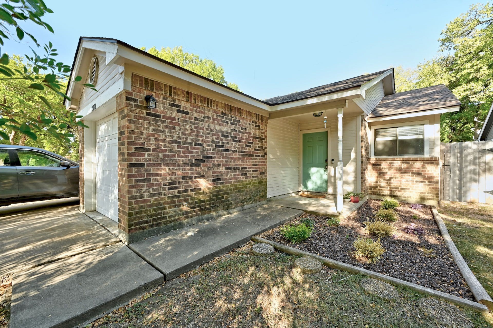 2503 Howellwood Way, Unit B Austin, TX 78748 - Photo 1 of 1 a front view of a house with a yard