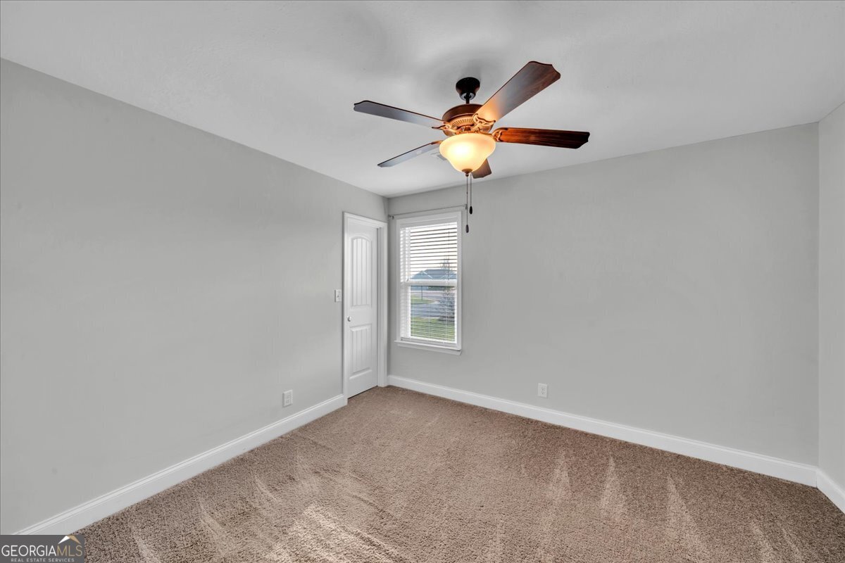 128 Gage Drive Perry, GA 31069 - Photo 23 of 38 a view of an empty room