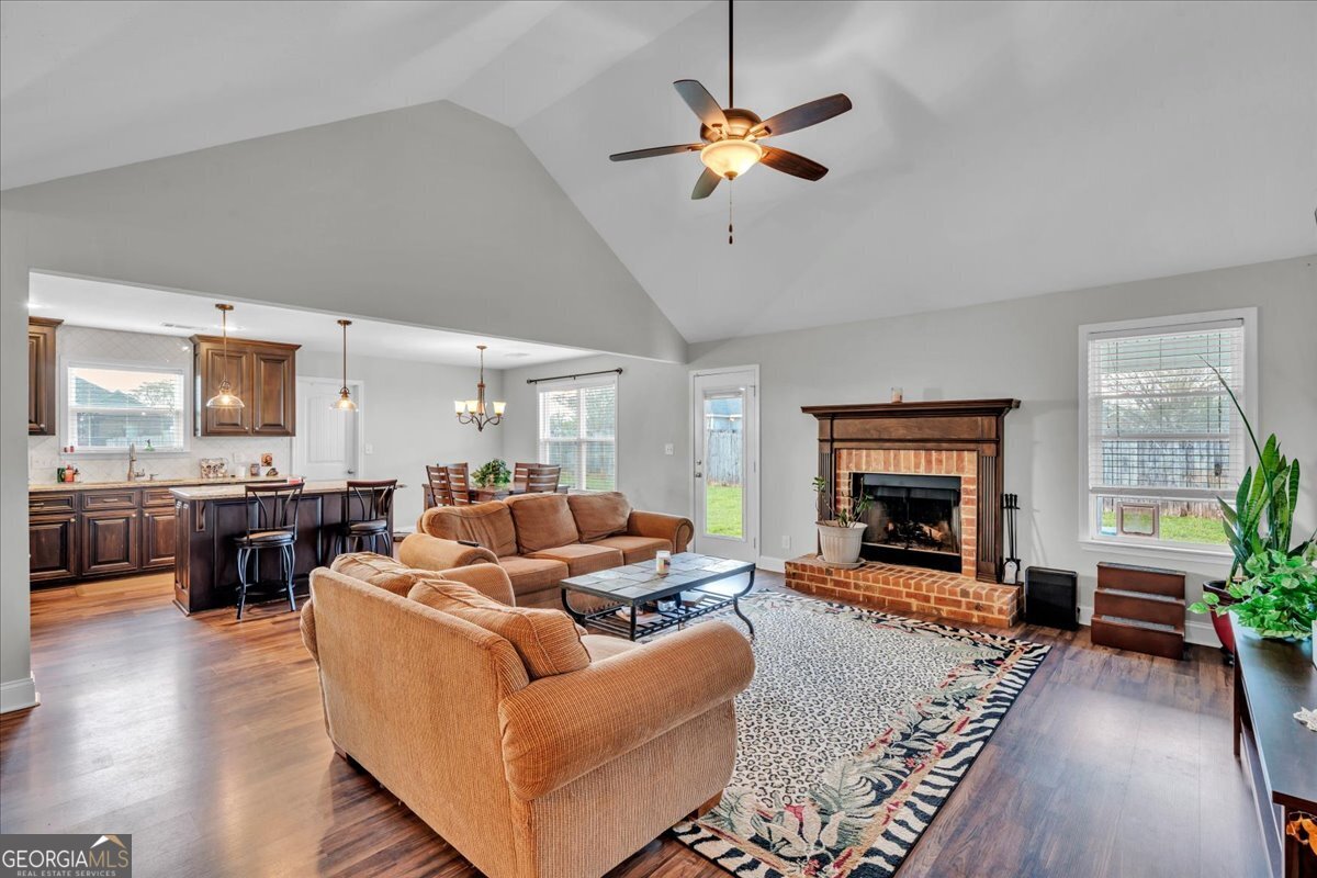 128 Gage Drive Perry, GA 31069 - Photo 3 of 38 a living room with furniture and a fireplace