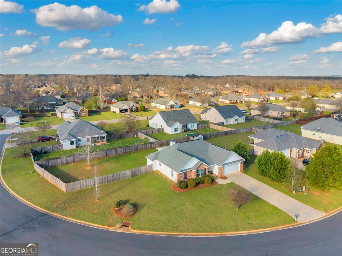 128 Gage Drive Perry, GA 31069 - Photo 33 of 38 an aerial view of residential houses with outdoor space