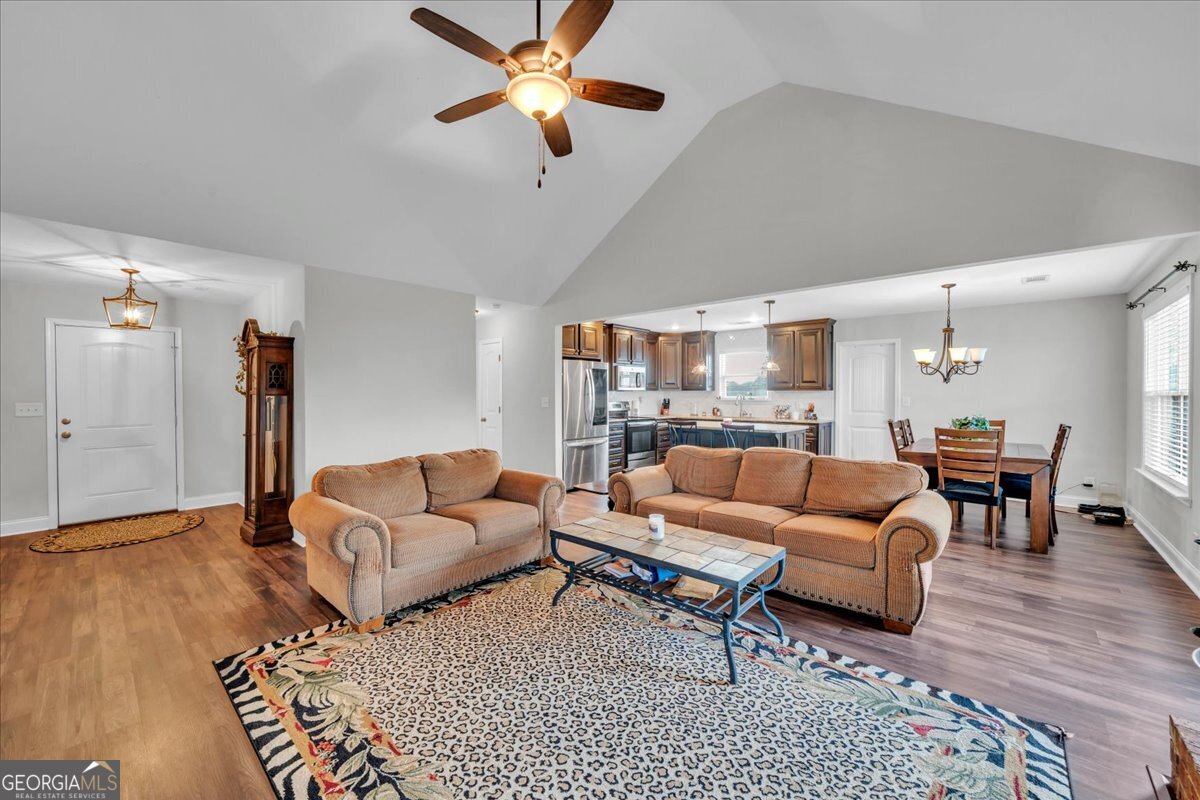 128 Gage Drive Perry, GA 31069 - Photo 4 of 38 a living room with furniture and a wooden floor