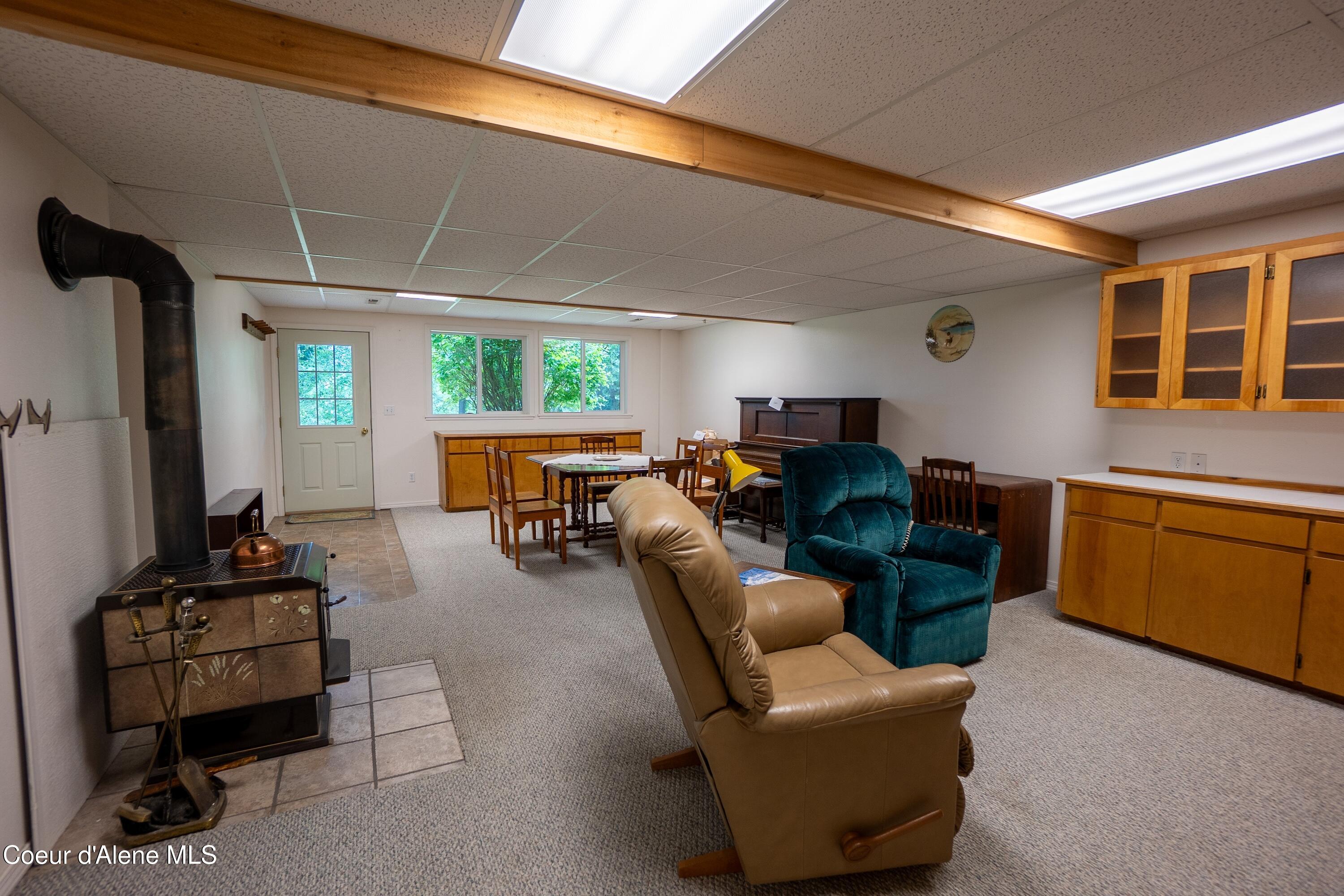 3228 Kootenai Trail Road Bonners Ferry, ID 83805 - Photo 18 of 30 Bsmnt Fam Rm Dining and Kitchen arrea