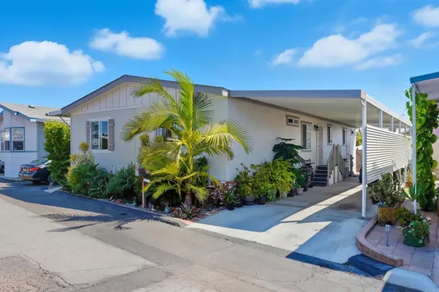 a house view with a garden space