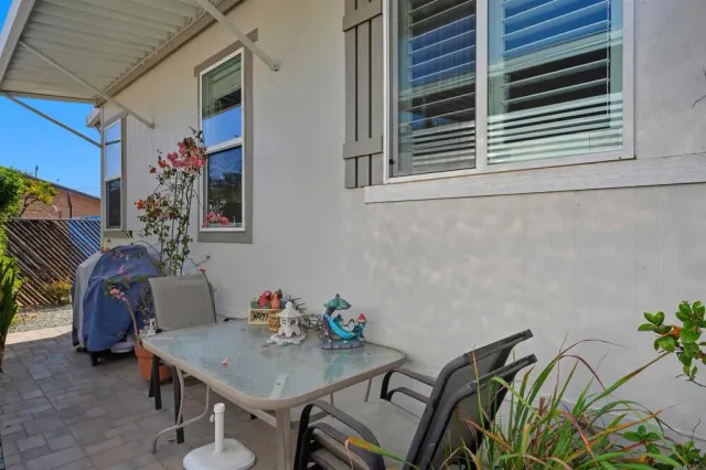 a view of a livingroom with furniture and window