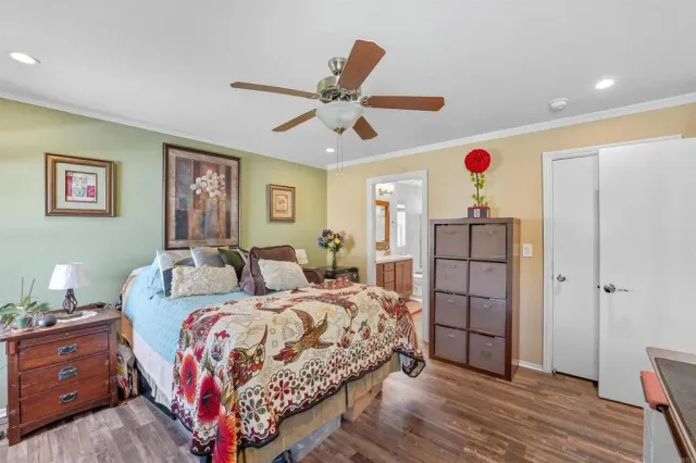 a bedroom with bed and window