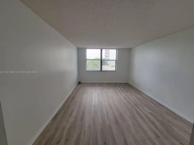 a view of swimming pool from a balcony