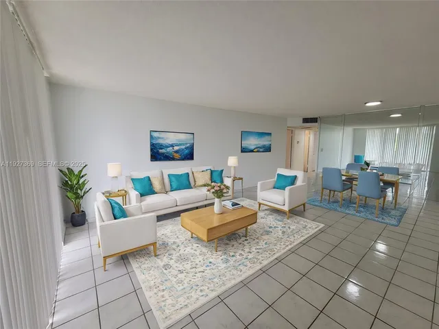 an empty room with white walls and tiles