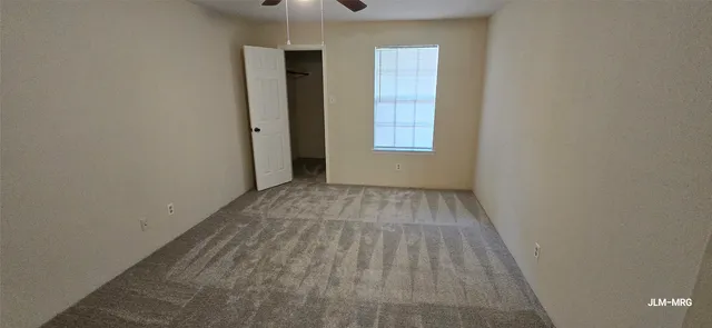 an empty room with window