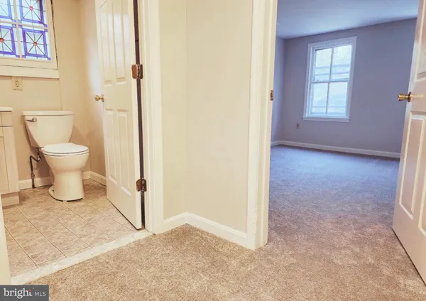 a bathroom with a toilet