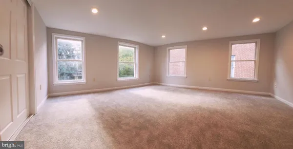 an empty room with windows