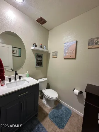 a spacious bedroom with a bed and window