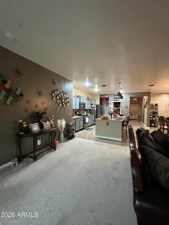 a living room with furniture and a area