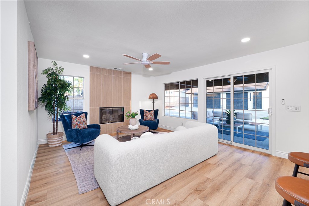 12982 Arapaho Road Rancho Cucamonga, CA 91739 - Photo 21 of 51 a bed room with furniture and a fireplace