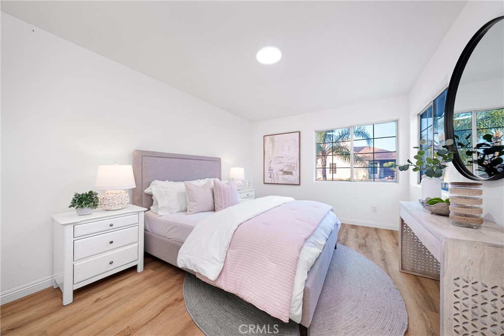 12982 Arapaho Road Rancho Cucamonga, CA 91739 - Photo 27 of 51 a bedroom with a bed and a window