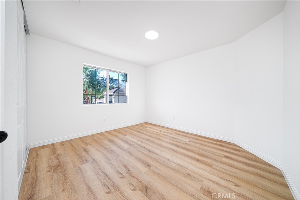 12982 Arapaho Road Rancho Cucamonga, CA 91739 - Photo 30 of 51 an empty room with windows