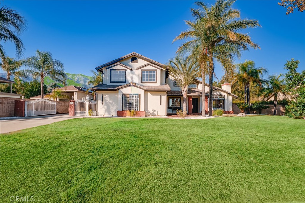 12982 Arapaho Road Rancho Cucamonga, CA 91739 - Photo 3 of 51 a view of a yard in front of the house