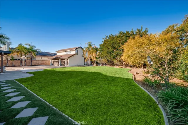 a view of a house with a big yard
