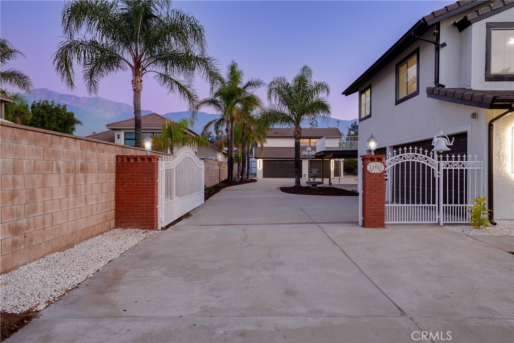 12982 Arapaho Road Rancho Cucamonga, CA 91739 - Photo 4 of 51 a view of a house with a park