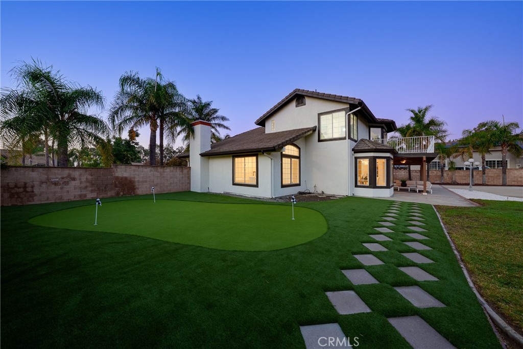 12982 Arapaho Road Rancho Cucamonga, CA 91739 - Photo 6 of 51 a front view of a house with garden