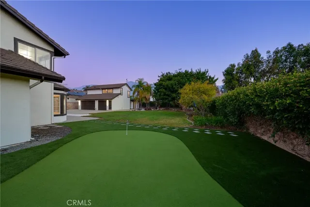 a house view with a garden space