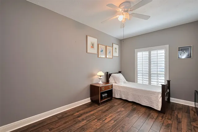 a room with bed and window