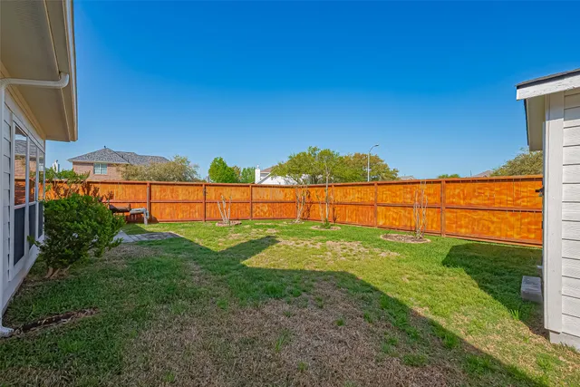 a view of an outdoor space and a yard