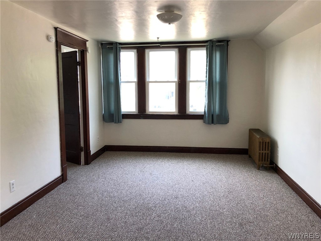 271 Bennett Road Cheektowaga, NY 14227 - Photo 12 of 27 UPPER LARGE LIVINGROOM WITH BERBER CARPETING