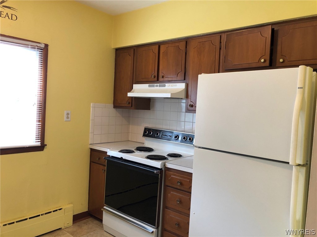 271 Bennett Road Cheektowaga, NY 14227 - Photo 20 of 27 LOWER KITCHEN WITH STOVE & REFRIGEATOR INCLUDED