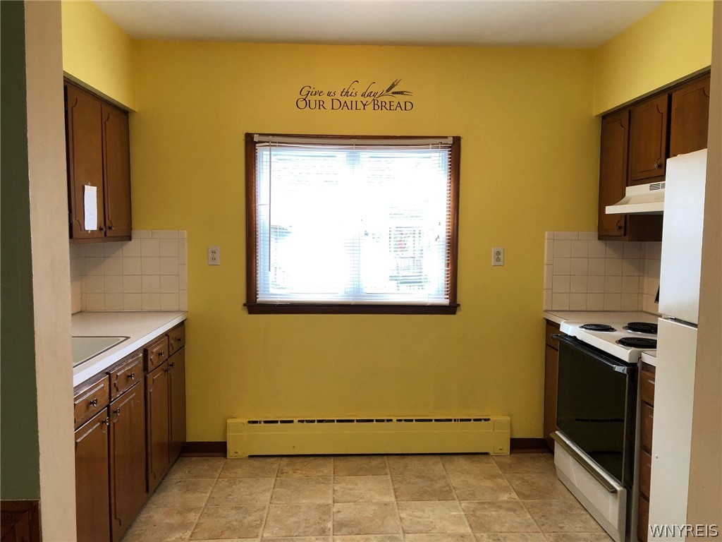 271 Bennett Road Cheektowaga, NY 14227 - Photo 24 of 27 VIEW OF KITCHEN FROM FORMAL DINING ROOM