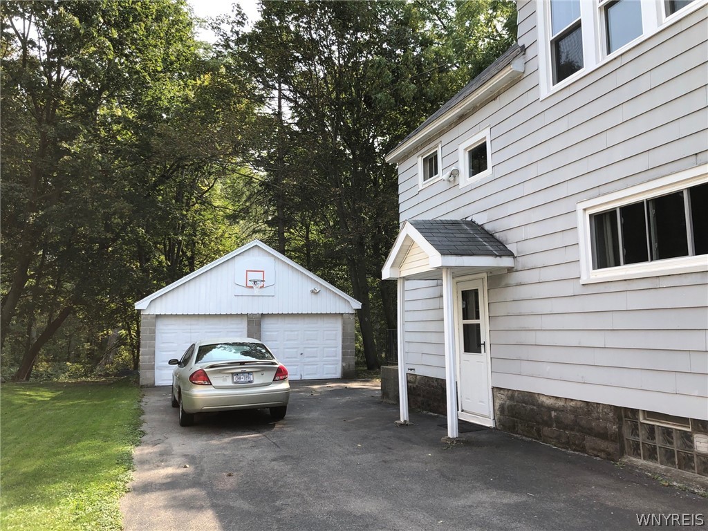 271 Bennett Road Cheektowaga, NY 14227 - Photo 4 of 27 BLACKTOP DRIVEWAY LEADS TO 2 CAR GARAGE