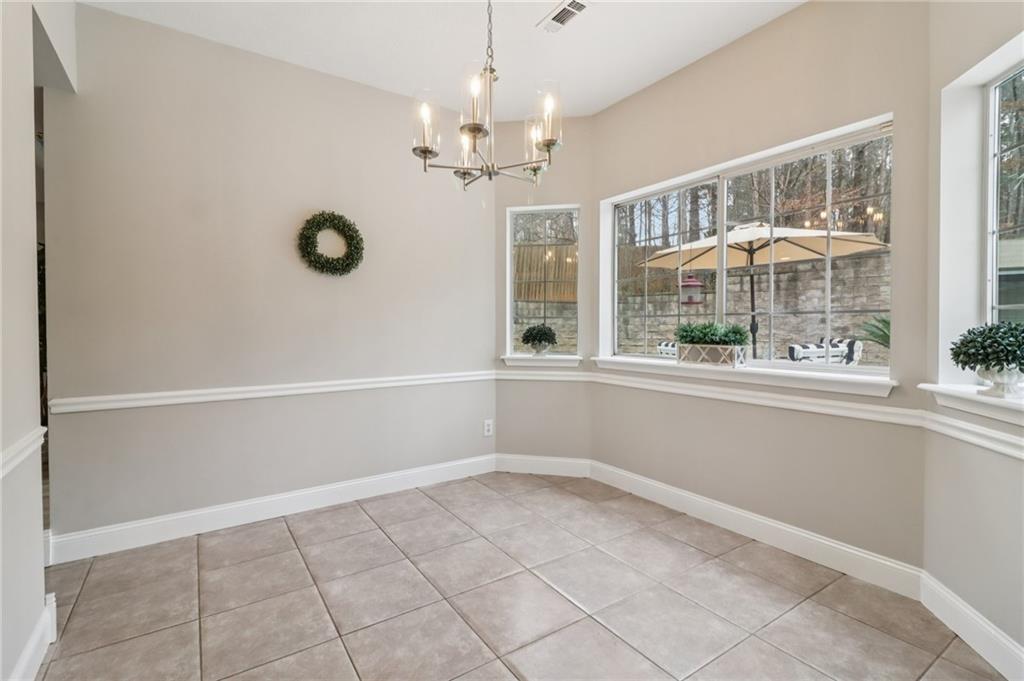 175 Meredith Way Stockbridge, GA 30281 - Photo 21 of 75 a view of an empty room with a window