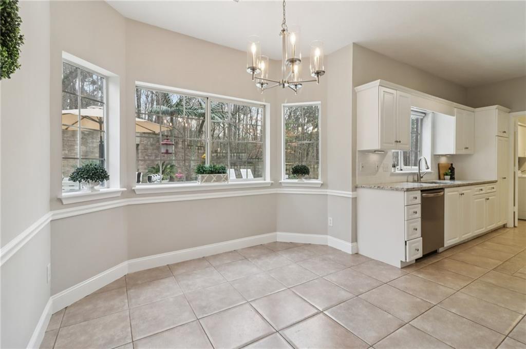 175 Meredith Way Stockbridge, GA 30281 - Photo 22 of 75 a view of a kitchen with a sink and windows