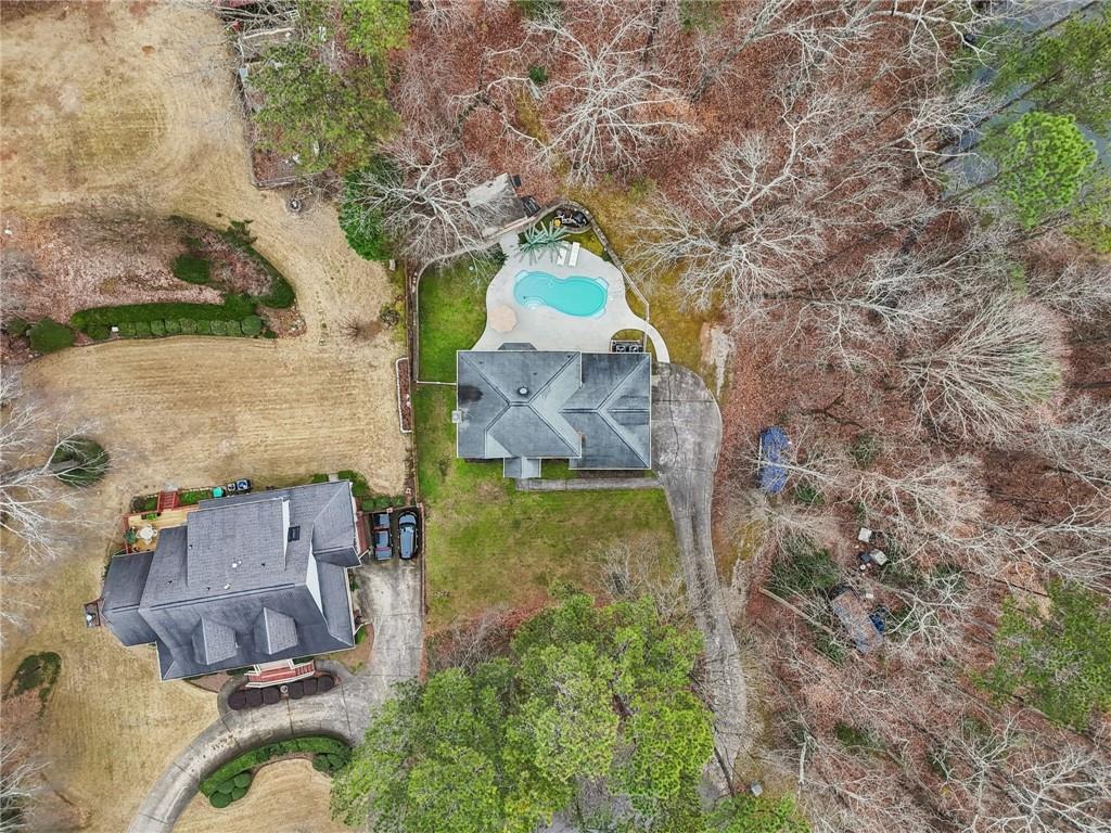 175 Meredith Way Stockbridge, GA 30281 - Photo 5 of 75 an aerial view of a house with a yard and a large tree