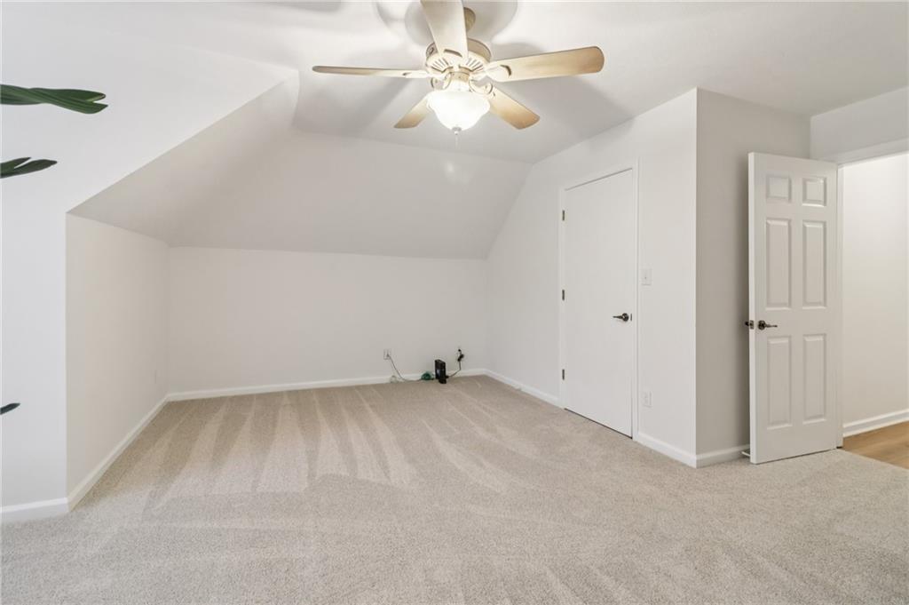 175 Meredith Way Stockbridge, GA 30281 - Photo 55 of 75 a view of an empty room with a ceiling fan