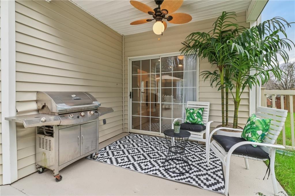 175 Meredith Way Stockbridge, GA 30281 - Photo 64 of 75 a view of a chairs and table in the patio