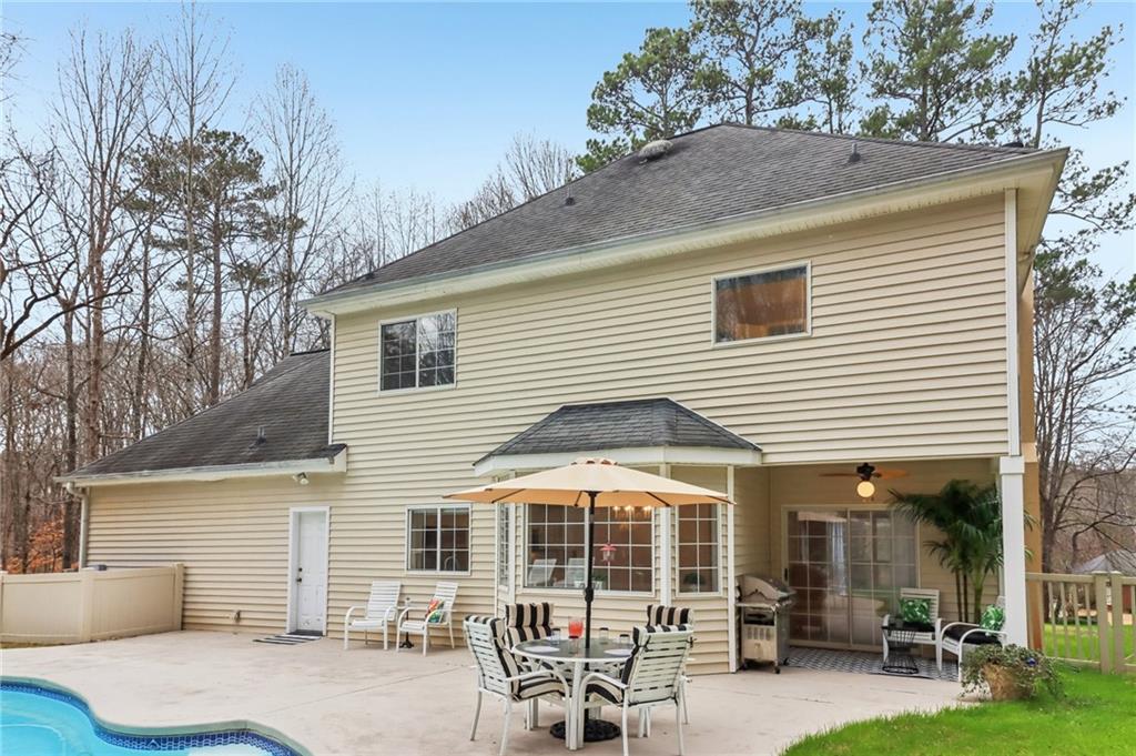 175 Meredith Way Stockbridge, GA 30281 - Photo 65 of 75 a view of a house with backyard and porch