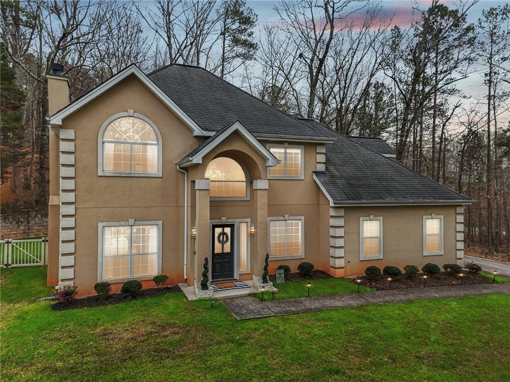 175 Meredith Way Stockbridge, GA 30281 - Photo 74 of 75 a front view of a house with a yard