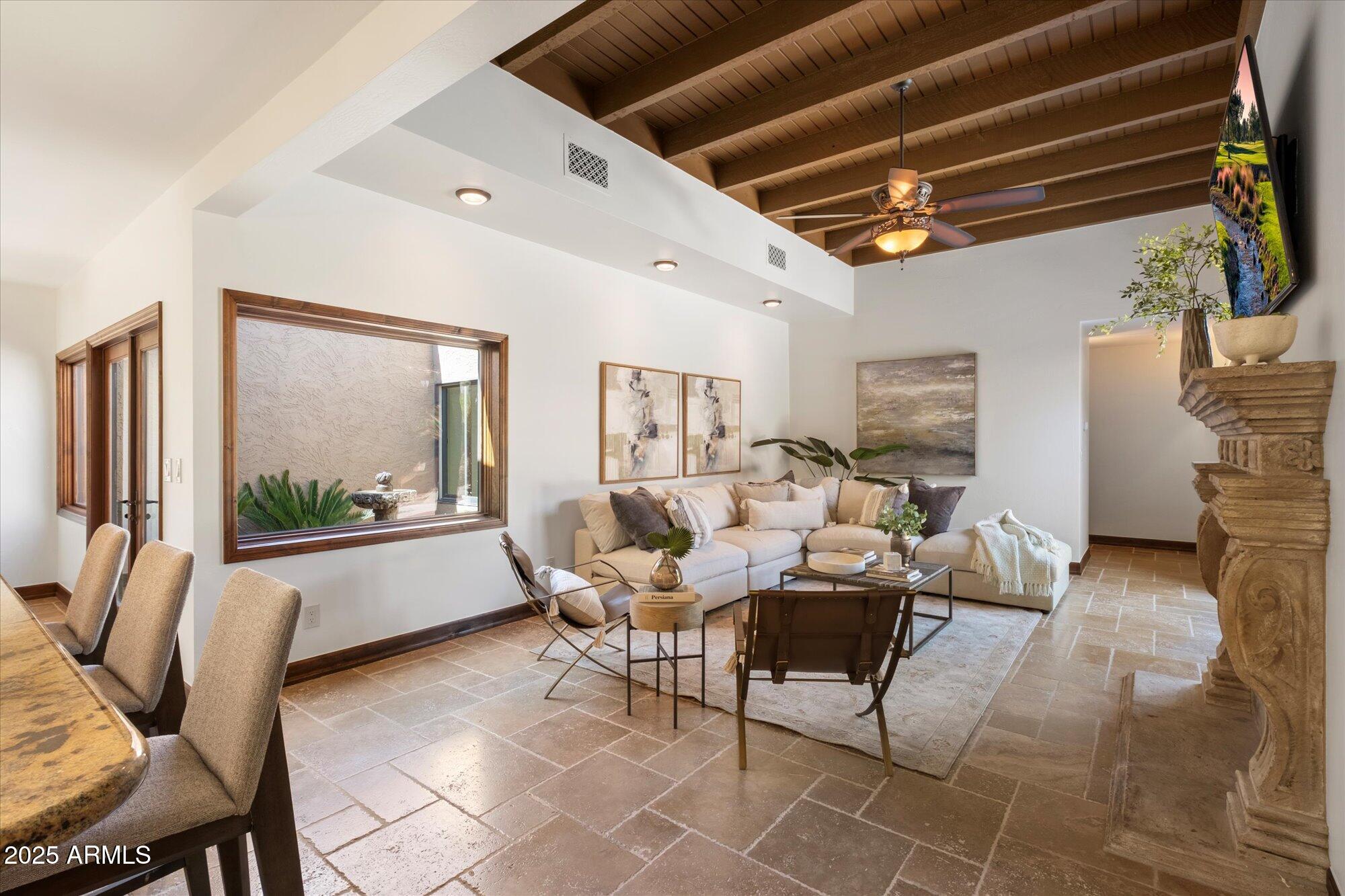 4448 East Camelback Road, Unit 16 Phoenix, AZ 85018 - Photo 19 of 108 Family Room opens to Kitchen