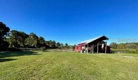 806 West Ariel Road Edgewater, FL 32141 - Photo 11 of 12 a view of a house with a yard