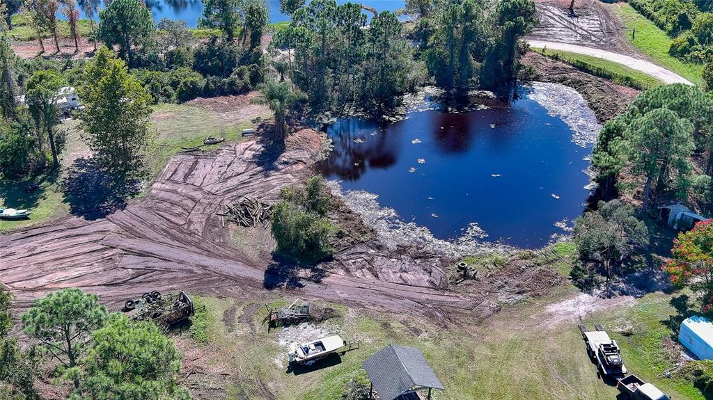 806 West Ariel Road Edgewater, FL 32141 - Photo 2 of 12 a view of water view with large trees